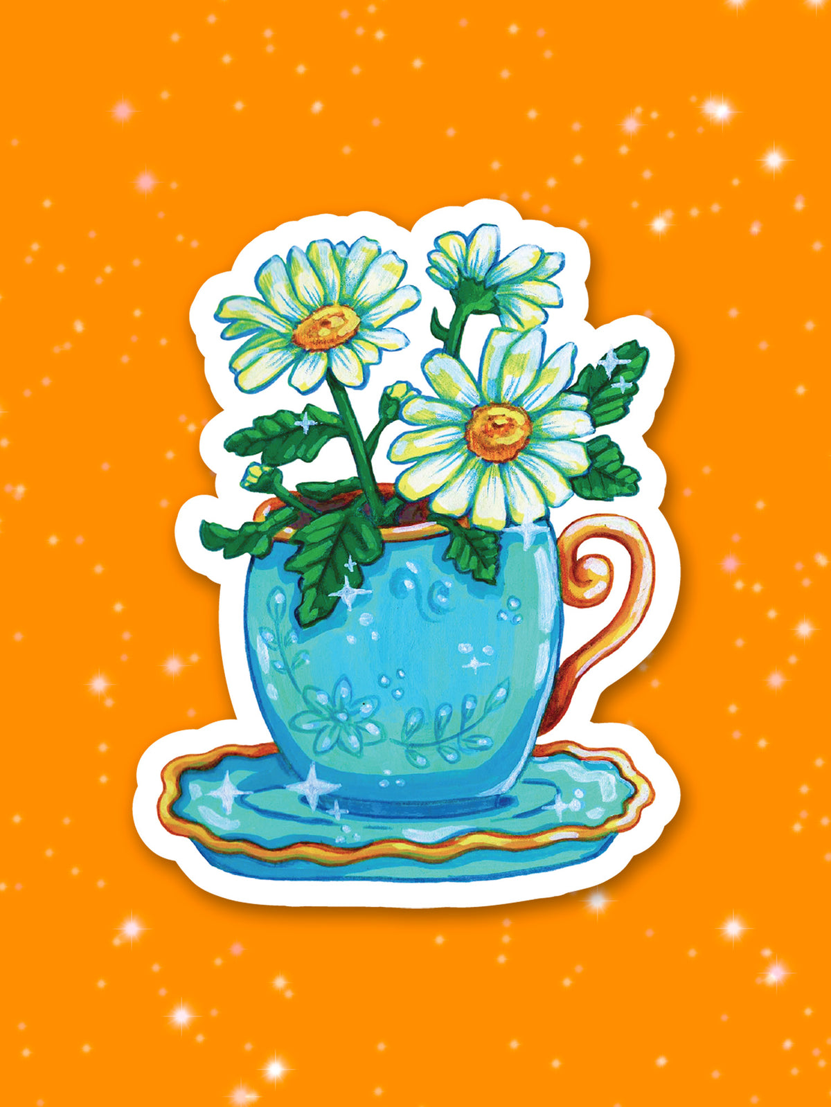 Blue teacup with gold handle with white flowers in it on an orange background